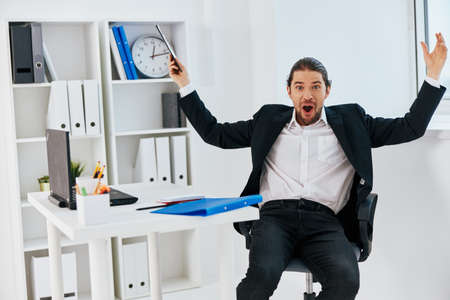 manager emotions work office desk technologyの写真素材