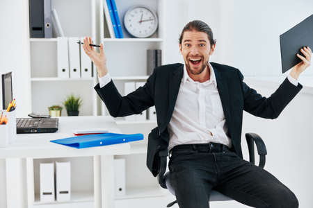 office worker workflow in the office documents emotions technologyの写真素材