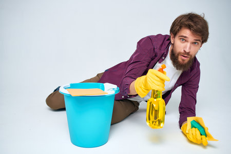 man with detergent cleaning hygiene provision of servicesの写真素材
