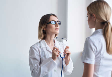 doctor and patient communication diagnostics clinic professionalの写真素材