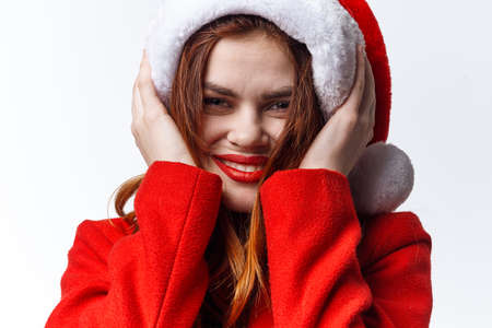 woman wearing santa costume fashion luxury posing holiday christmasの写真素材