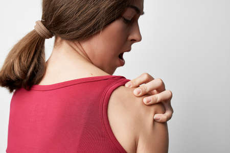 woman with joint pain hand injury medicine treatmentの写真素材