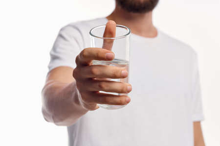 man in white t-shirt health care light backgroundの写真素材