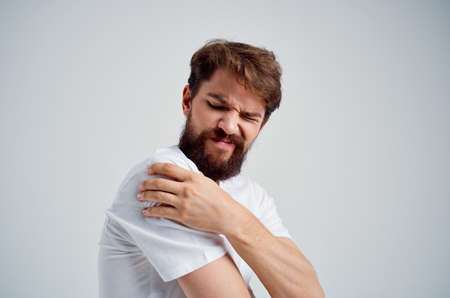 man pain in the neck health problems massage therapy isolated backgroundの写真素材