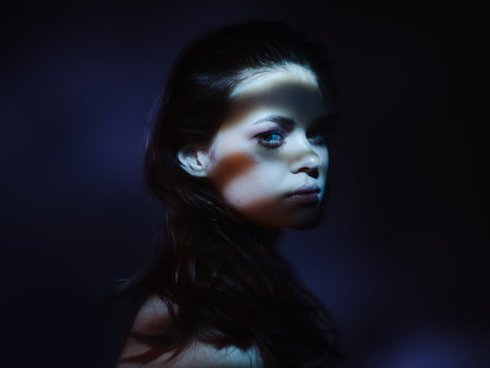 pretty woman dark background posing fashion