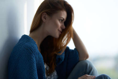 beautiful woman attractive look with a blue plaid smileの写真素材