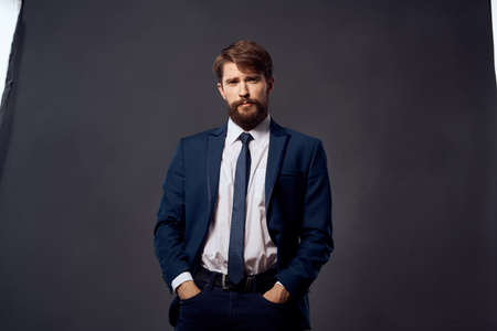 The man in a suit emotions hand gestures isolated backgroundの写真素材