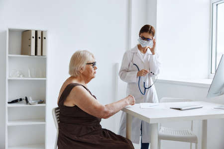 old woman patient hospital examination health careの写真素材