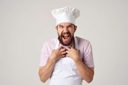 emotional male chef kitchen restaurant service workの写真素材