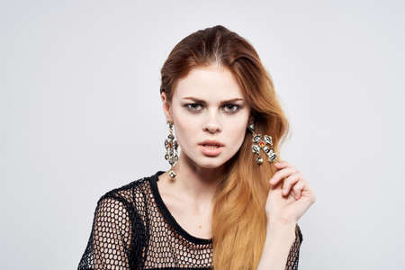 pretty woman Glamor posing makeup passion sexy trend light backgroundの写真素材