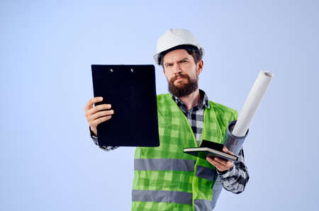 engineer in a white helmet blueprints Professional studio industryの写真素材