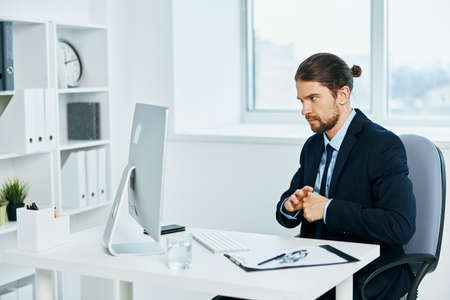 businessman work in front of a computer documents executiveの写真素材