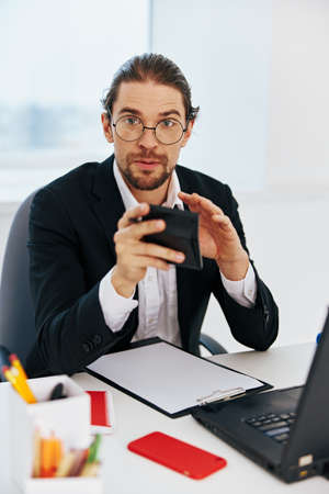 manager documents work office laptop lifestyleの写真素材