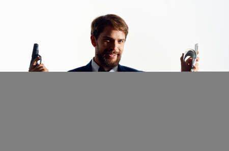 businessmen with a gun in hand Studio emotionsの写真素材