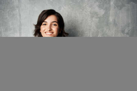 woman in blue shirt package with groceries in supermarket food dietの写真素材