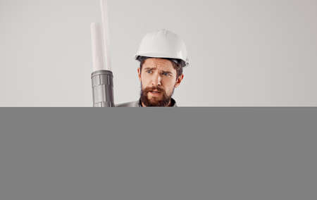 engineer with documents and drawings blueprints studio industryの写真素材