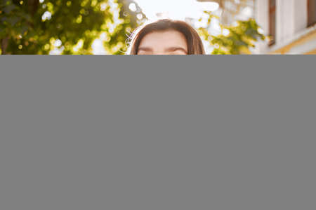 cheerful woman walking in red skirt outdoors entertainmentの写真素材