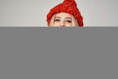 beautiful woman in fashionable clothes Red Hat posing Studioの写真素材