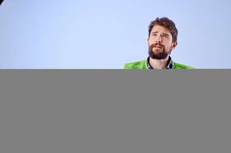 male worker in a white helmet blueprints Professional isolated backgroundの写真素材