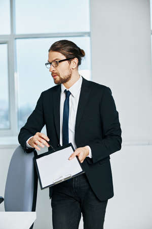 office worker an official is working at the computer technologiesの写真素材