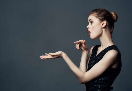 cheerful woman Red hair charm posing cosmetics isolated backgroundの写真素材