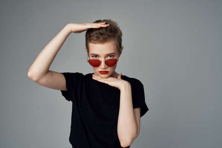 pretty woman black T-shirt modern style dark backgroundの写真素材