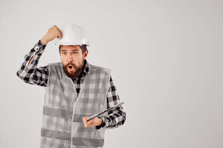 engineer in a gray vest construction work design studio industryの写真素材