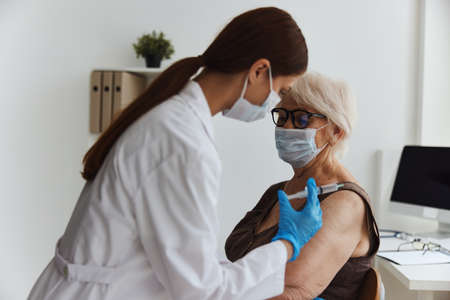 elderly woman covid passport virus epidemicの写真素材