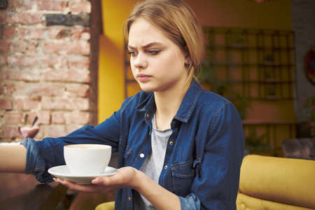 pretty woman sitting in a cafe rest Lifestyleの写真素材