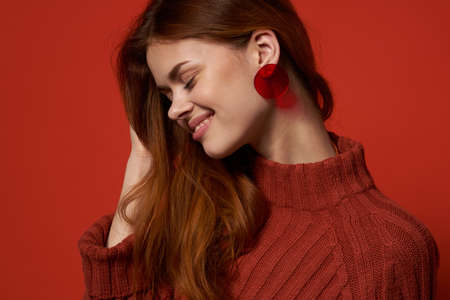 woman holding her head hairstyle fashion studio decorationの写真素材