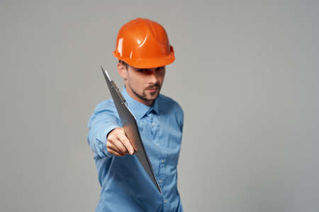 Man in working form construction work isolated backgroundの写真素材