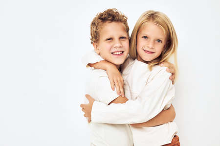 little cheerful cheery friends gesticulate with their hands isolated backgroundの写真素材