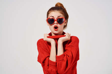 woman modern style sunglasses light backgroundの写真素材