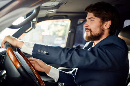 bearded man official passenger driver road success service richの写真素材