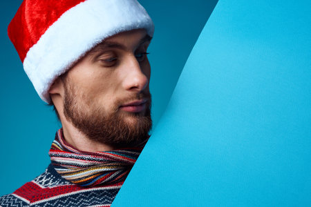 Cheerful man in a christmas blue mockup Poster isolated backgroundの写真素材