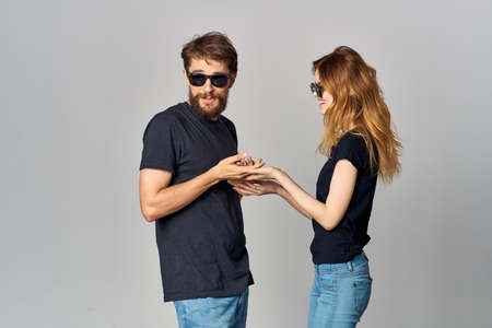 married couple friendship communication romance wearing sunglasses studio lifestyleの写真素材