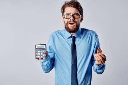 business man with glasses with bitcoin cryptocurrency finance economy managerの写真素材