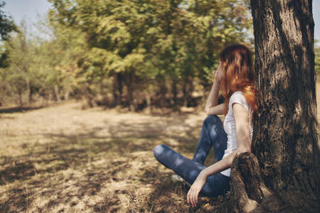 pretty woman rest in the countryside nature Lifestyle summerの写真素材