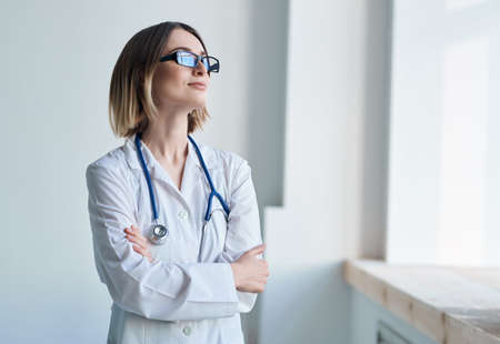 female doctor white coat professional medicine stethoscopeの写真素材