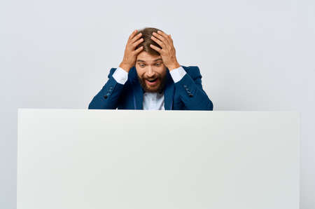 businessmen white banner in hand blank sheet presentation copy-space studioの写真素材