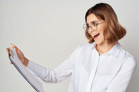 Businesswoman with documents in hand Lifestyle isolated backgroundの写真素材