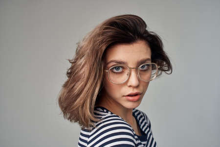 beautiful woman with glasses modern style hairstyleの写真素材
