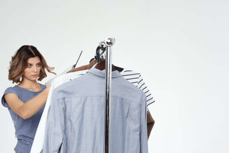woman  choosing clothes background.の写真素材