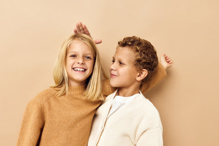 happy children stand side by side isolated background