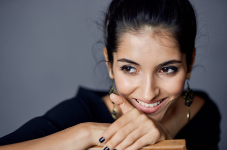 beautiful woman posing model attractive look decoration smile dark background