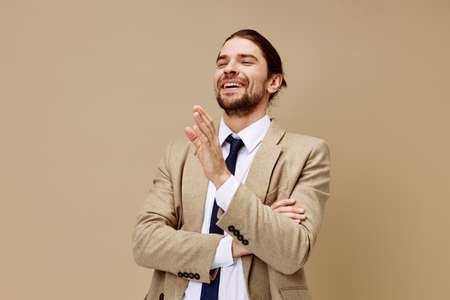 businessman in a suit with a tie posing lifestyle modelの写真素材