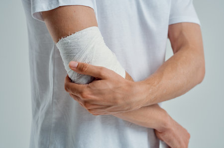 sick man hand injury treatment health problems hospital medicineの写真素材