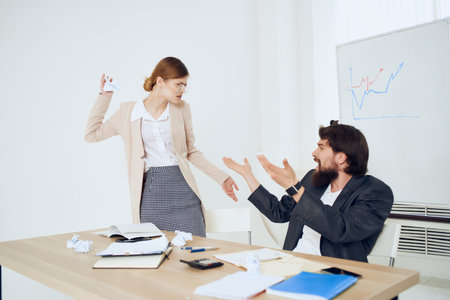 boss shouting at woman office dissatisfaction business work emotionsの写真素材