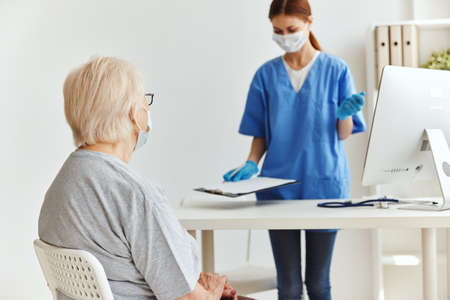 nurse and patient Hospital visit treatmentの写真素材