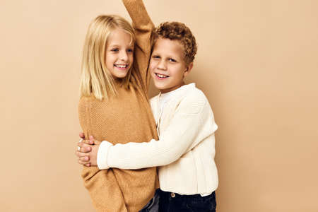 boy and girl happy fashion youth stylish-clothing childhood isolated backgroundの写真素材